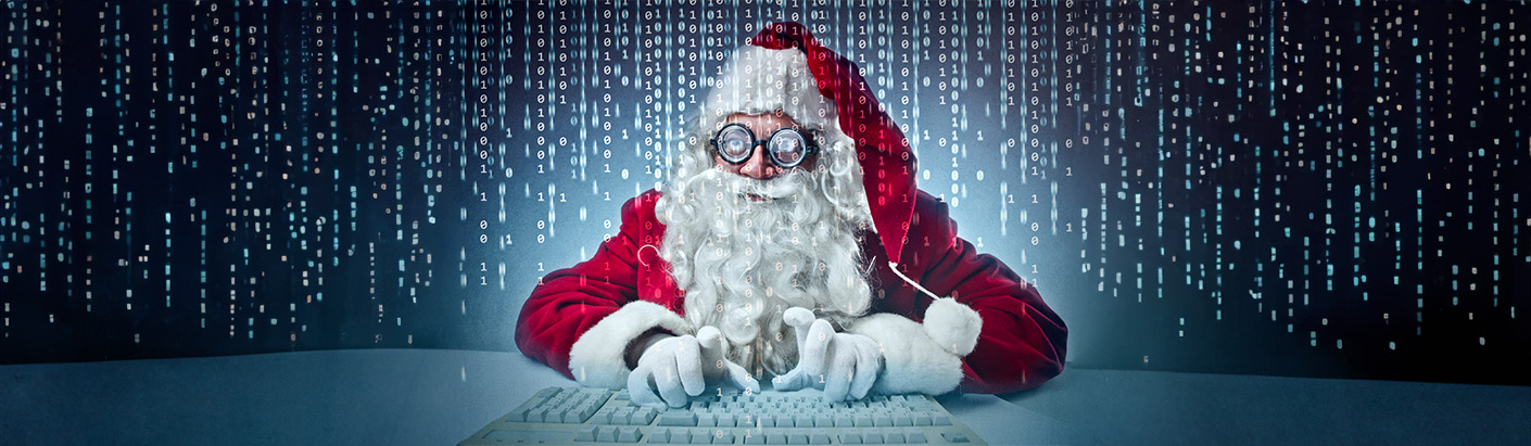 Cyber santa figure typing on a keyboard.